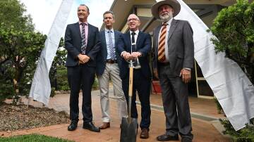 Carinya' Board chair Ross Fotheringham,Carinya business manager Stephen Carter, principal David Jones and Tamworth mayor Russell Webb were on hand to dig up the school's 2004 time capsule as part of the 40th anniversary activities. Picture by Gareth Gardner