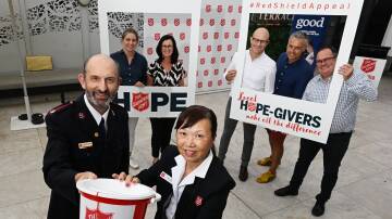 Tamworth Salvos' Majors Tony and Yan DeTomaso with local business supporters, Emily Coles, Penny O'Mally, Sam Treloar, Wade O'Shea and Bryan Singh kick off the 2024 Red Shield Appeal. Picture by Gareth Gardner